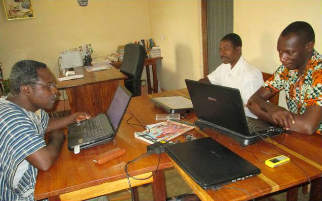 Akebu translators working on computers